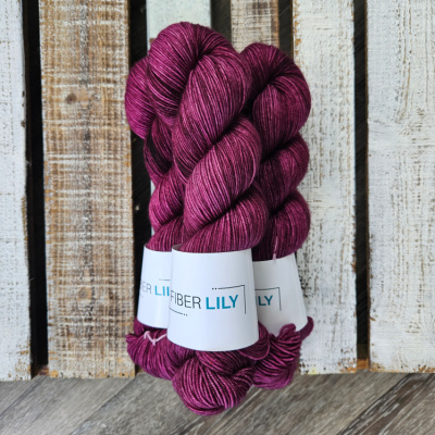 Reign is a rich regal magenta coloured yarn.