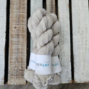 three skeins of taupe grey hand dyed wool