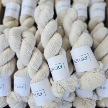 Bundle of Ivory coloured skeins of yarn