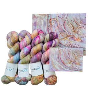 Skeins of pink, purple, blue and olive hand dyed sock yarn representing an original watercolour painting.