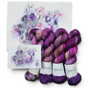 Skeins of purple pink and pecan hand dyed sock yarn representing an original watercolour painting.