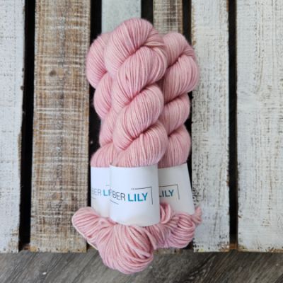 Three skeins of soft pink hand dyed yarn