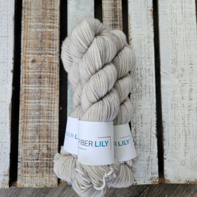 three skeins of taupe grey hand dyed wool